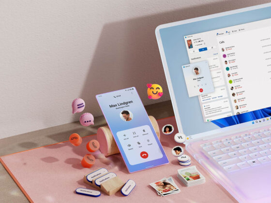 msft open laptop with mobile phone floating emojis RW10WBx